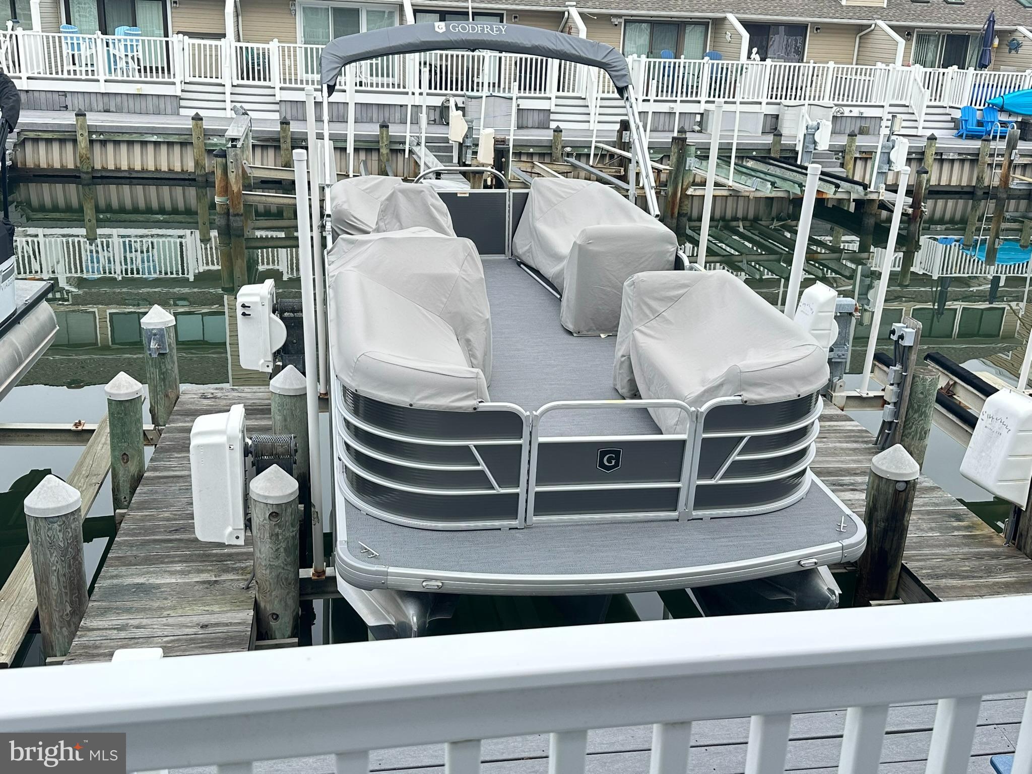 712 Mooring Road Ocean City, MD 21842 - Photo 15 of 60 a building outdoor space with patio furniture