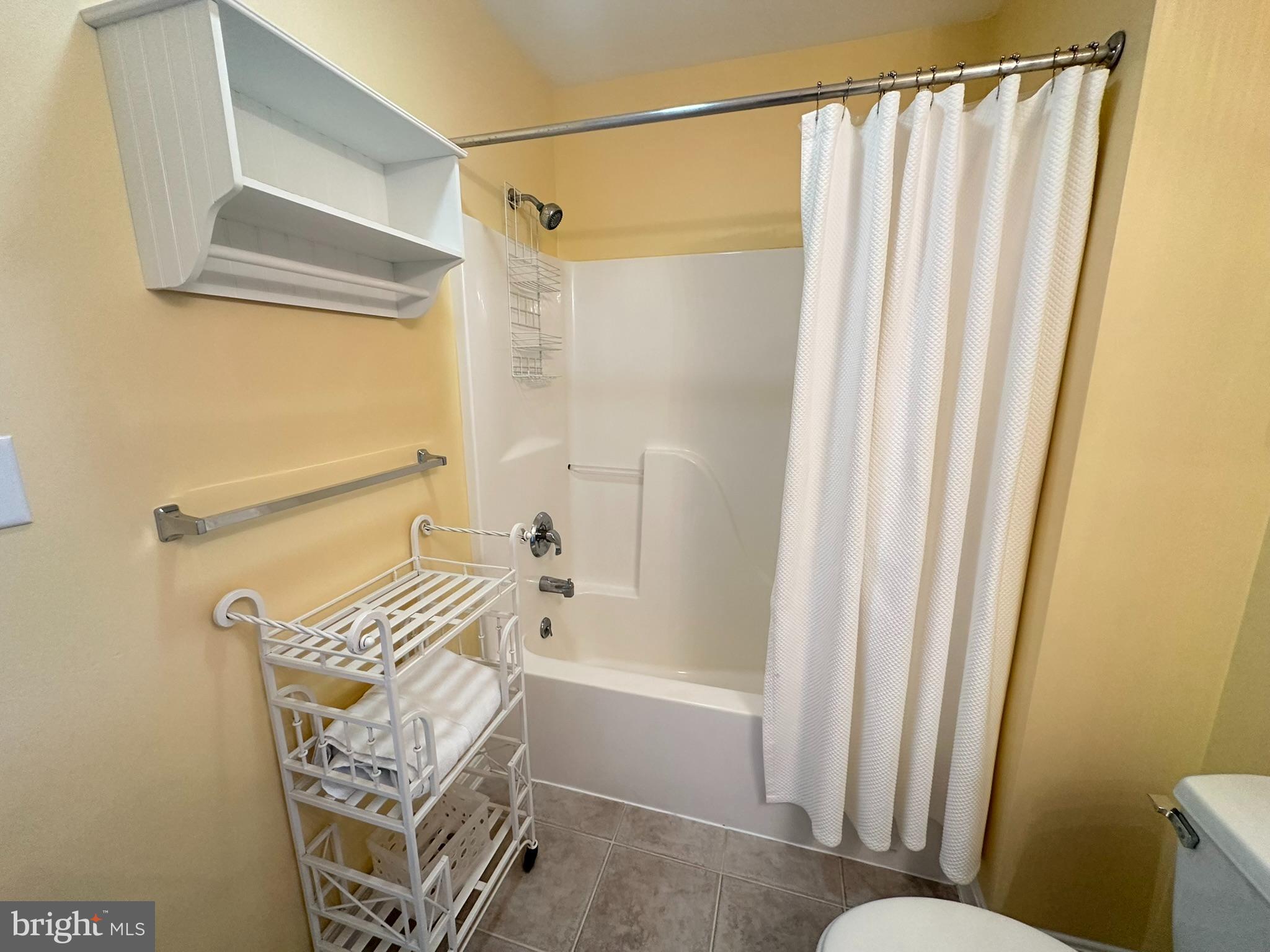 712 Mooring Road Ocean City, MD 21842 - Photo 22 of 60 a bathroom with a sink and a shower