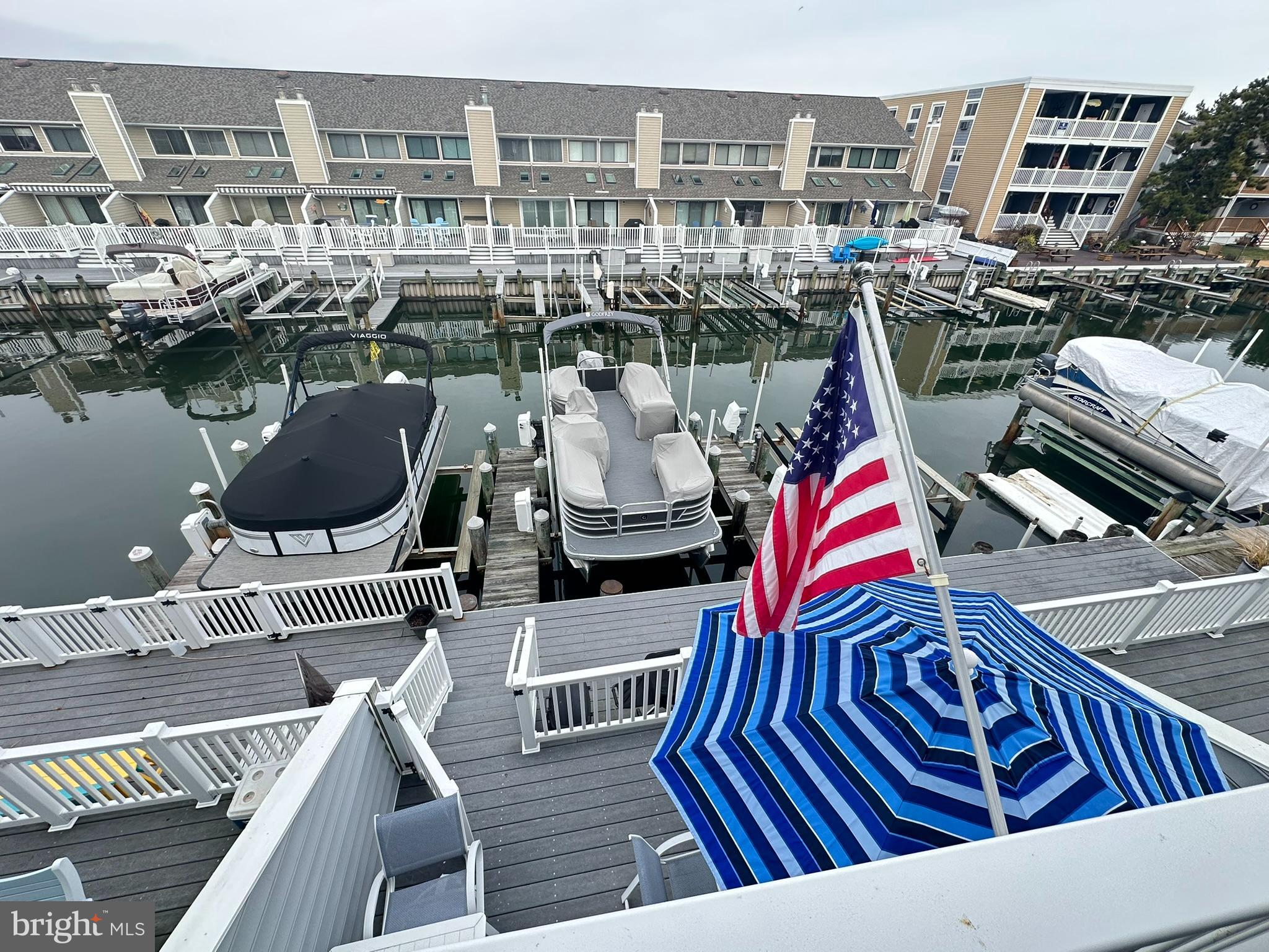 712 Mooring Road Ocean City, MD 21842 - Photo 24 of 60 a view of balcony patio and outdoor seating