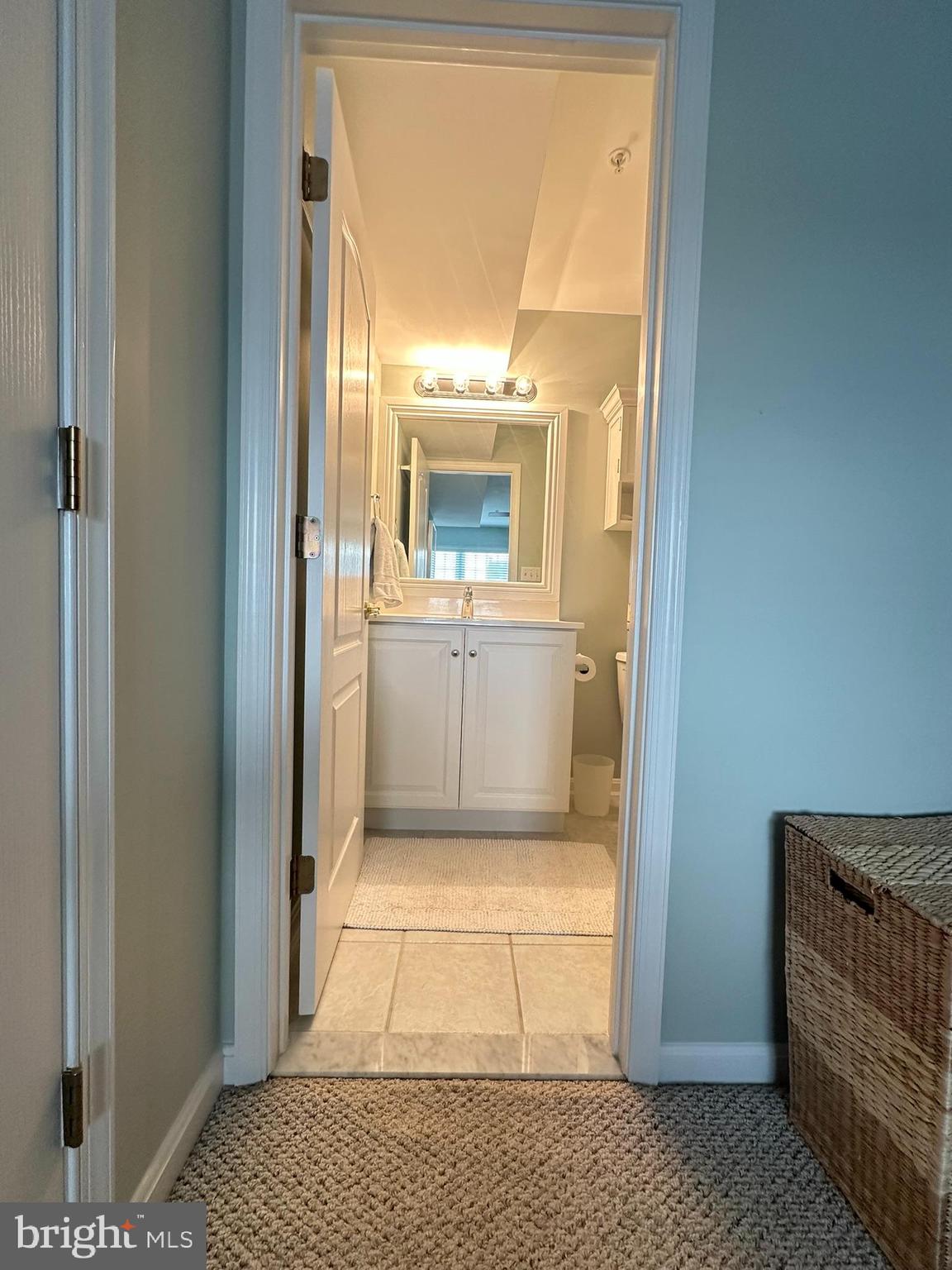 712 Mooring Road Ocean City, MD 21842 - Photo 30 of 60 a view of an empty room with a fireplace and a window