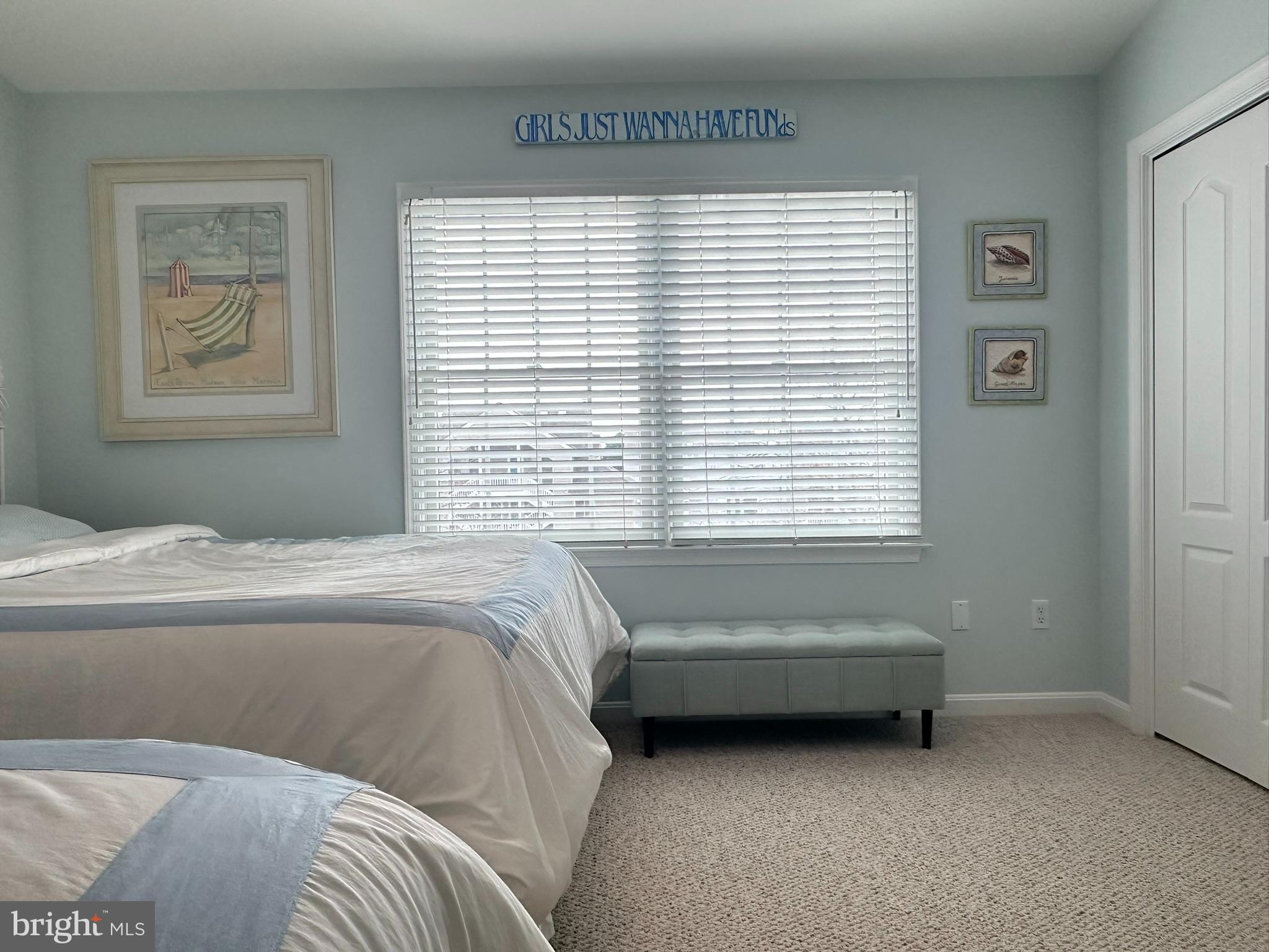 712 Mooring Road Ocean City, MD 21842 - Photo 38 of 60 a bedroom with a bed and a window