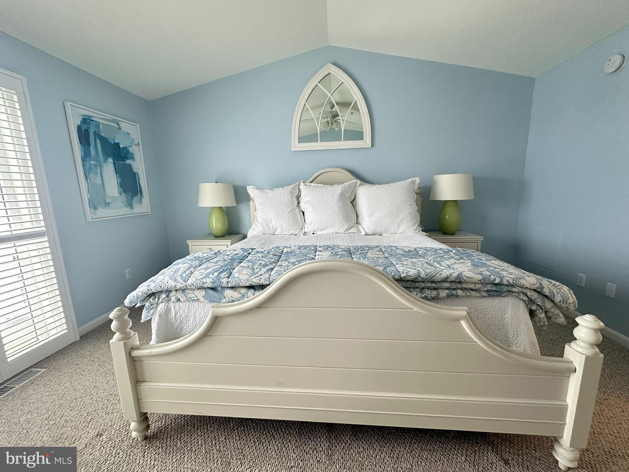 712 Mooring Road Ocean City, MD 21842 - Photo 43 of 60 a bedroom with a bed and a window