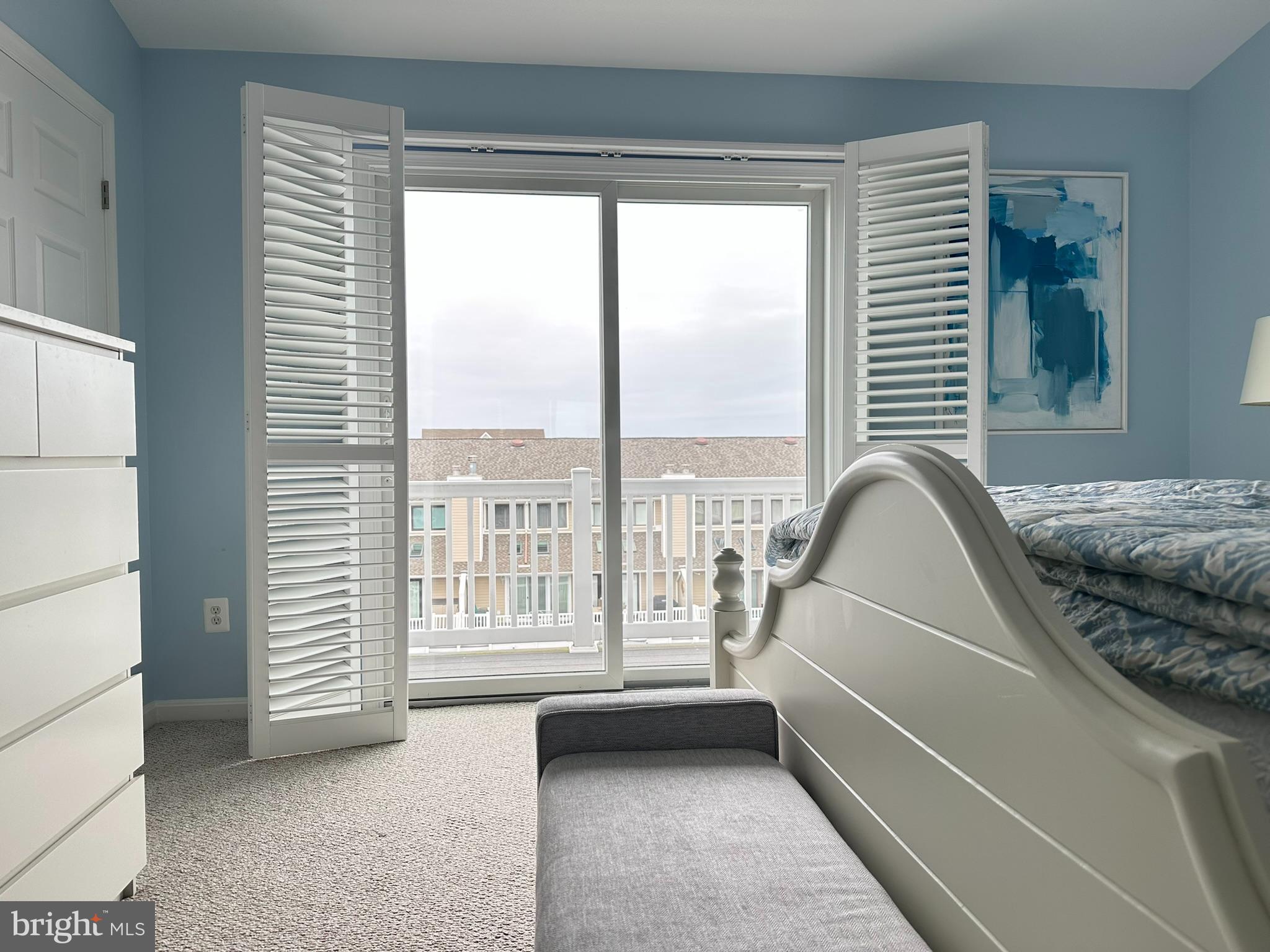 712 Mooring Road Ocean City, MD 21842 - Photo 50 of 60 a living room with furniture and a large window