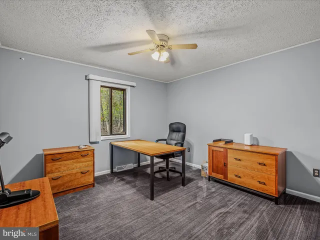 a room with furniture and window