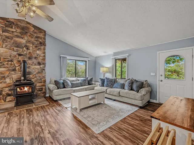 a living room with furniture and a couch