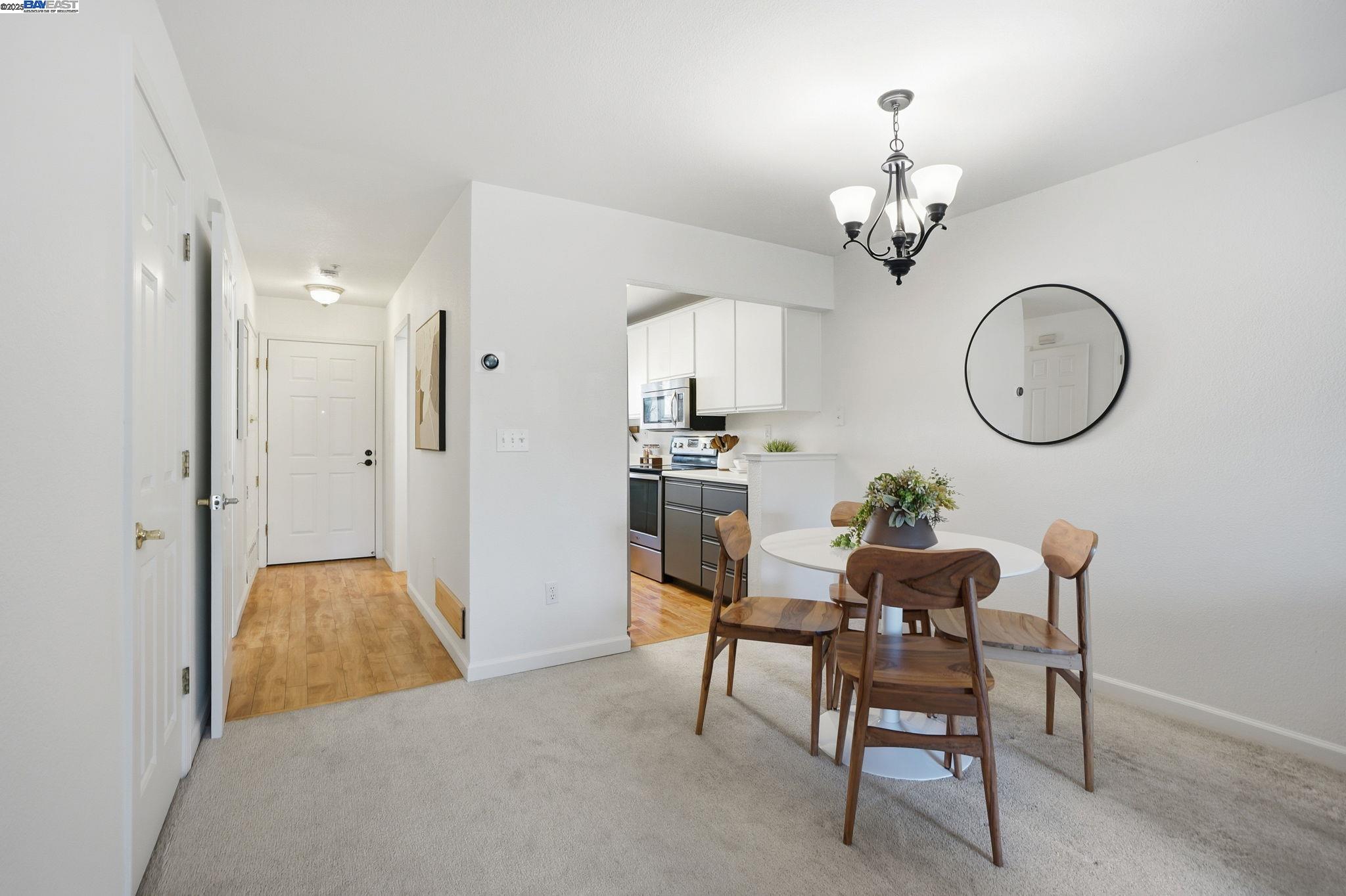 2586 Oak Road, Unit 229 Walnut Creek, CA 94597 - Photo 16 of 39 a view of a dining room with furniture