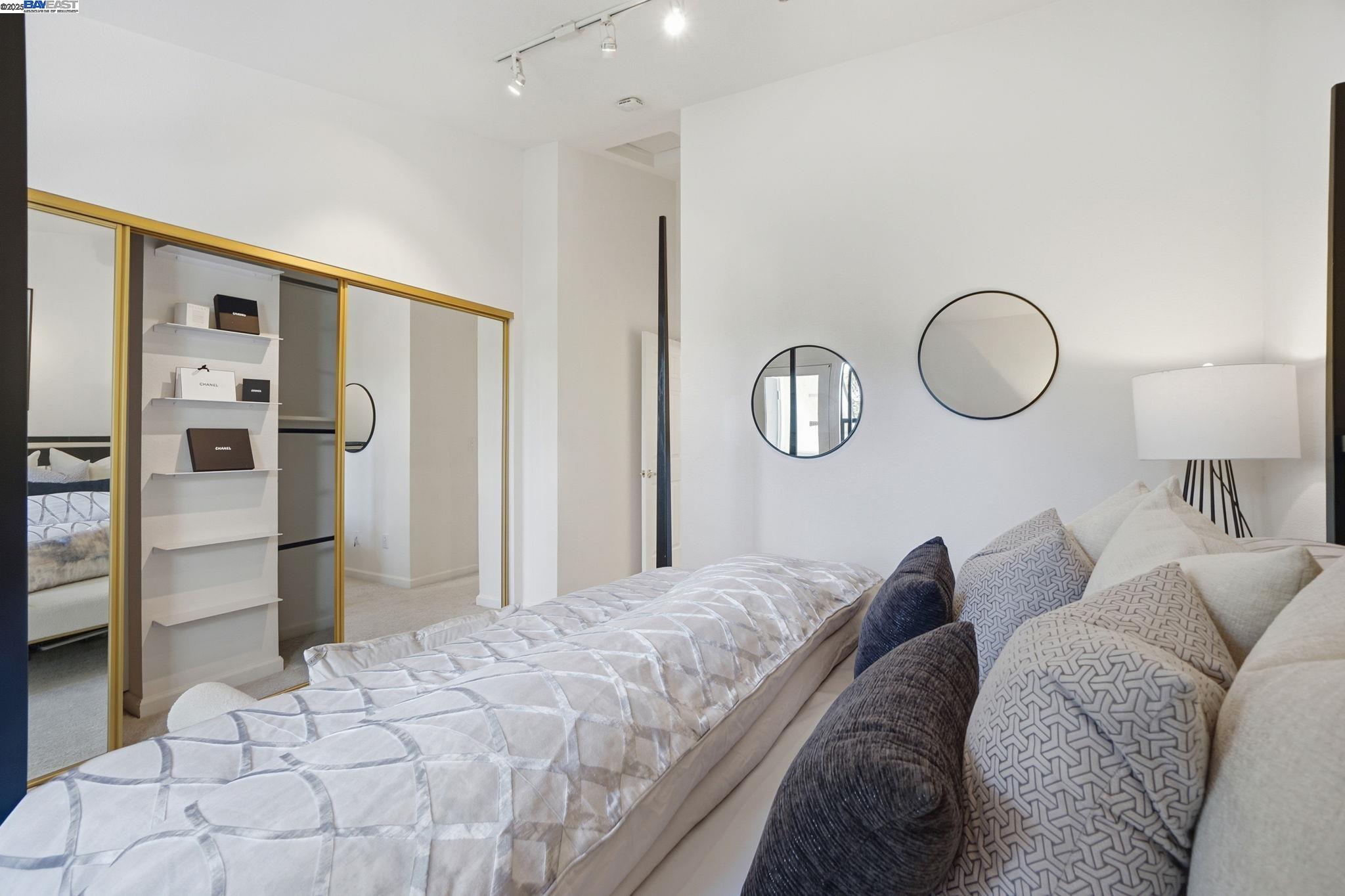 2586 Oak Road, Unit 229 Walnut Creek, CA 94597 - Photo 24 of 39 a living room with furniture a large window and stainless steel appliances