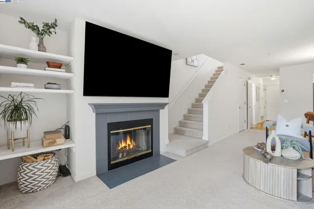 a living room with furniture and a couch