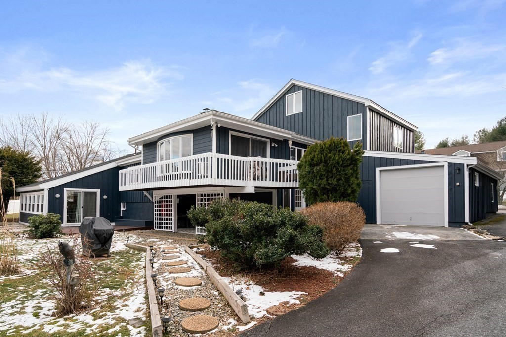 a front view of a house with yard