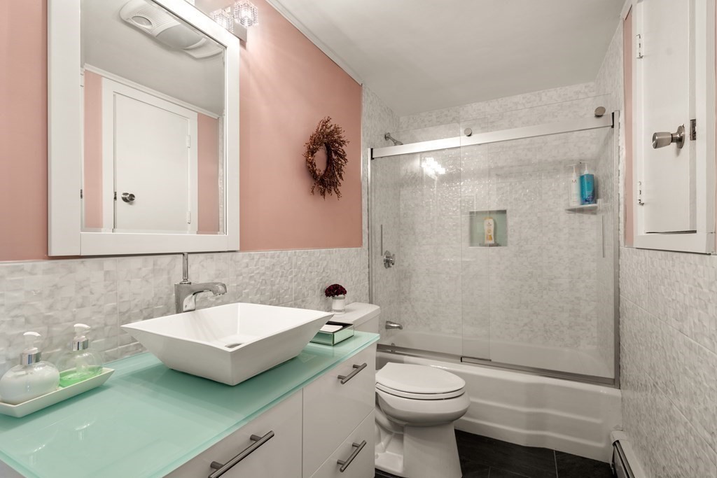 238 West Acton Road Stow, MA 01775 - Photo 11 of 37 a bathroom with a sink toilet and shower