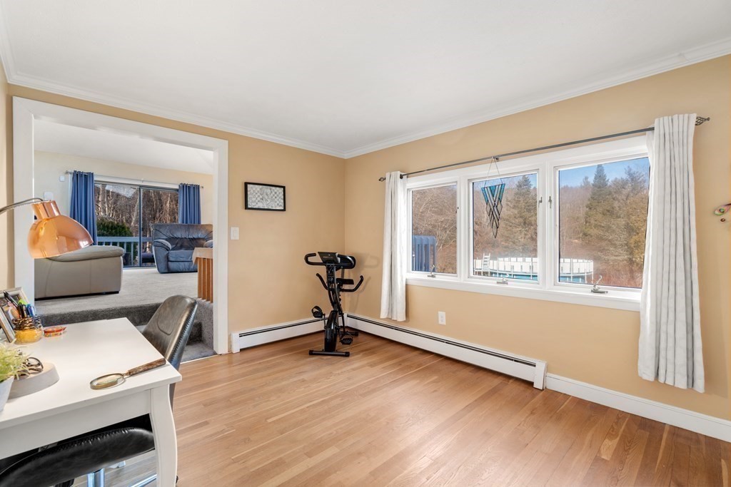 238 West Acton Road Stow, MA 01775 - Photo 12 of 37 a view of a livingroom with furniture and a window