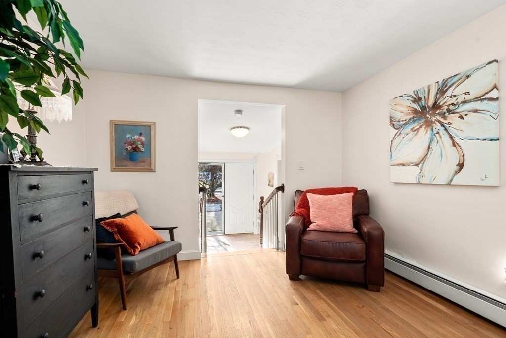 238 West Acton Road Stow, MA 01775 - Photo 20 of 37 a bedroom with furniture and wooden floor
