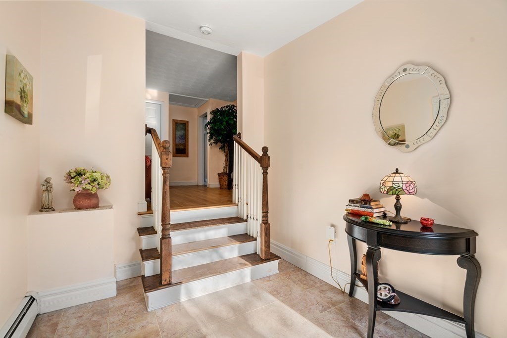 238 West Acton Road Stow, MA 01775 - Photo 23 of 37 a view of a hallway with workspace