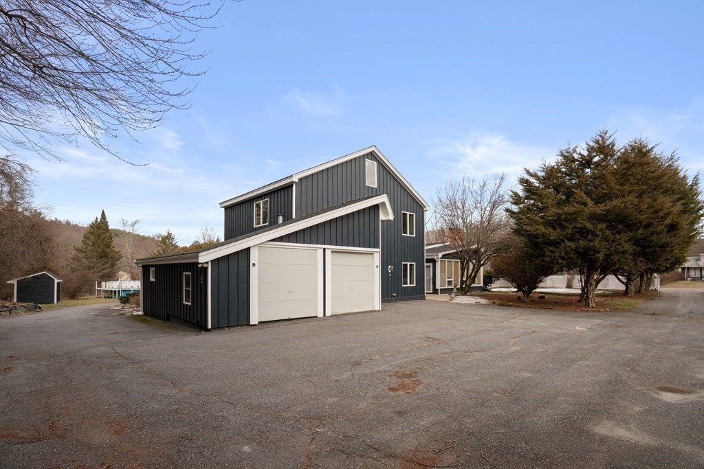 238 West Acton Road Stow, MA 01775 - Photo 26 of 37 a view of a house with a outdoor space