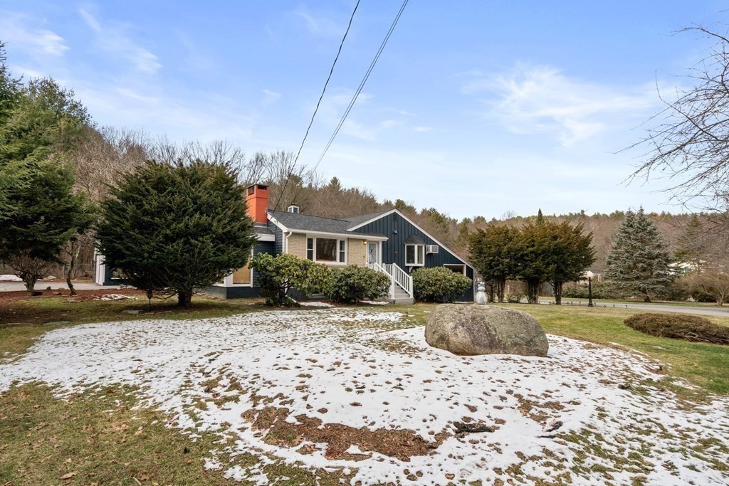 238 West Acton Road Stow, MA 01775 - Photo 27 of 37 a front view of a house with a yard