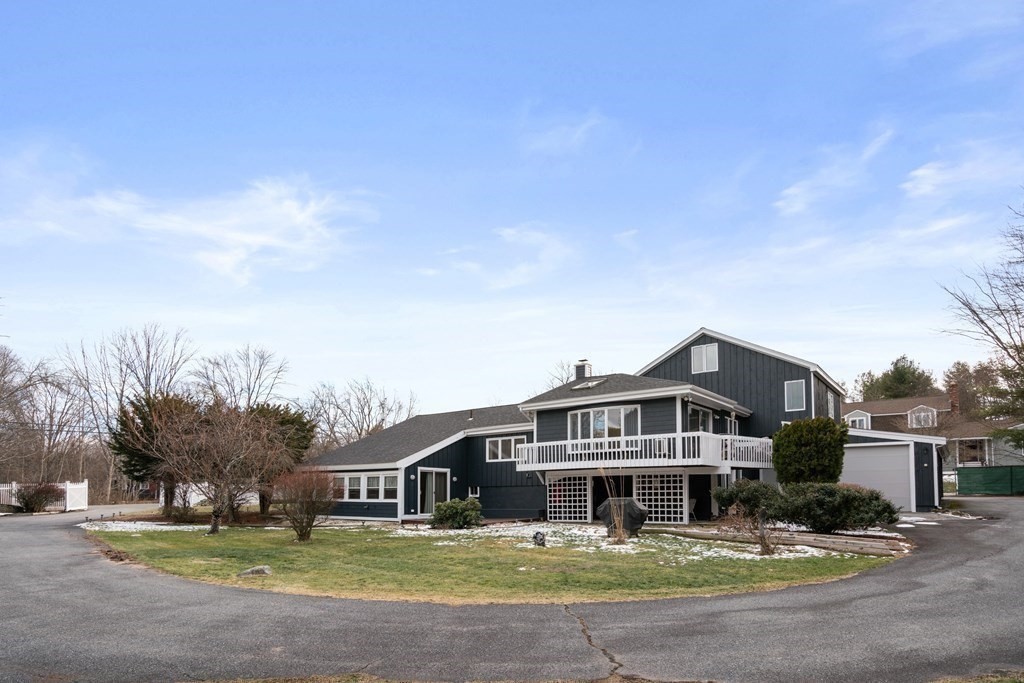 238 West Acton Road Stow, MA 01775 - Photo 30 of 37 a front view of a house with garden