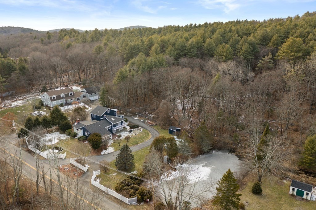 238 West Acton Road Stow, MA 01775 - Photo 33 of 37 a view of a forest with a lake