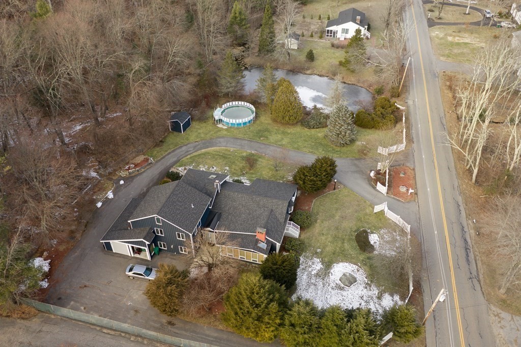 238 West Acton Road Stow, MA 01775 - Photo 35 of 37 an aerial view of a residential house with outdoor space