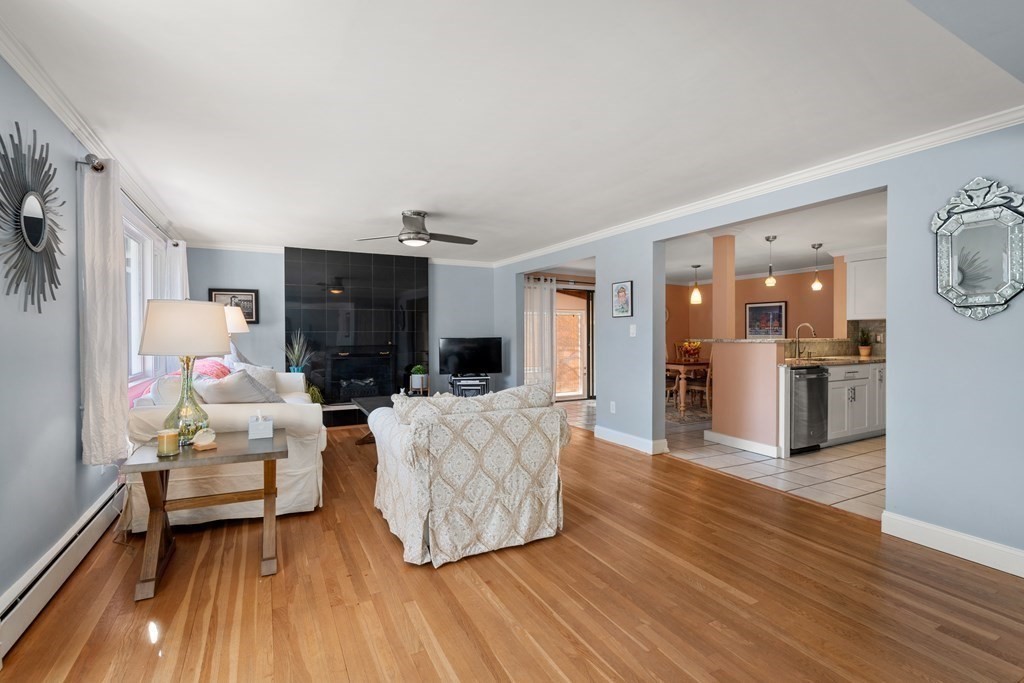 238 West Acton Road Stow, MA 01775 - Photo 7 of 37 a living room with furniture and a wooden floor
