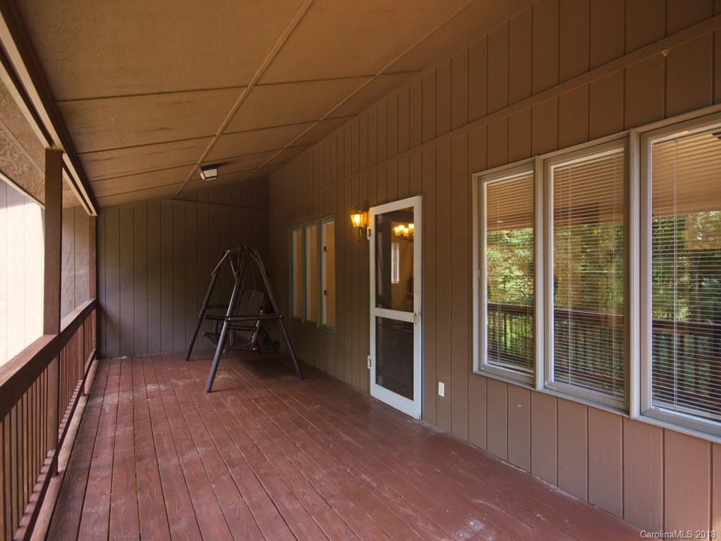 39 Forest Road Canton, NC 28716 - Photo 2 of 18 a view of a room with wooden floor and windows