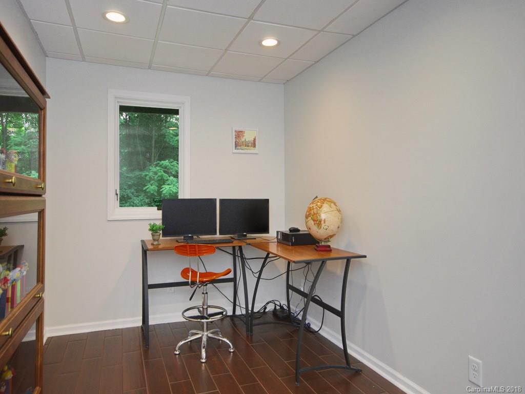39 Forest Road Canton, NC 28716 - Photo 17 of 18 a workspace with furniture and a window