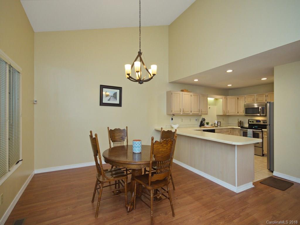 39 Forest Road Canton, NC 28716 - Photo 7 of 18 a view of a dining room and chairs in a room