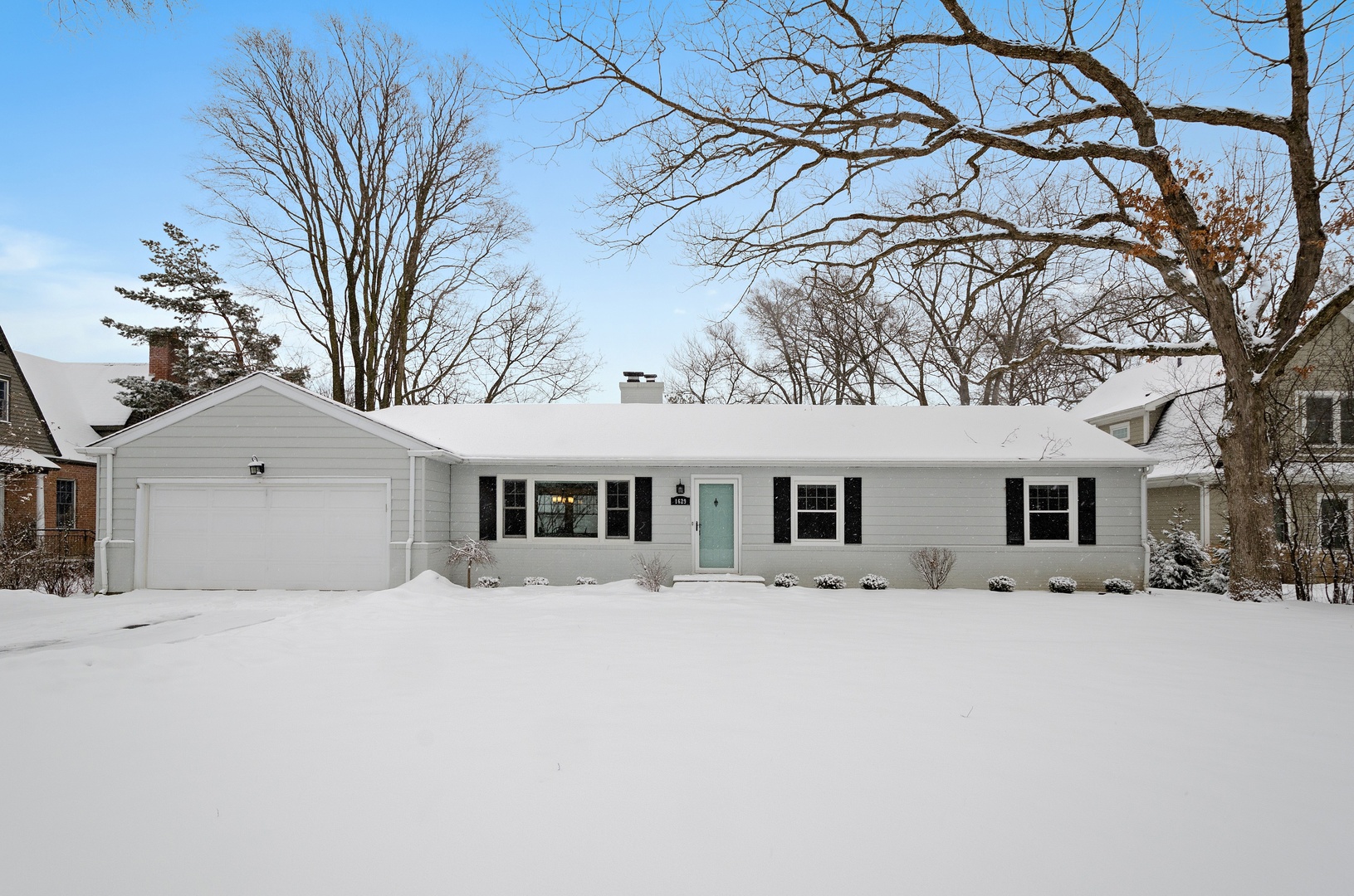 1629 Sunset Ridge Road Glenview, IL 60025 - Photo 1 of 1 front view of house with a yard