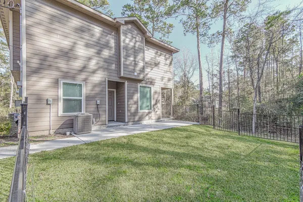 a house view with a sitting space and garden space
