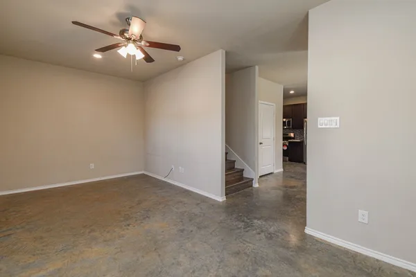 an empty room with a bathroom