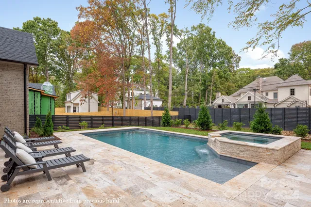 a view of outdoor space yard swimming pool and patio