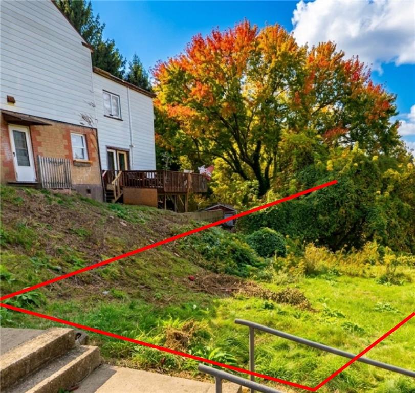 384 Sterling Street Pittsburgh, PA 15205 - Photo 1 of 2 a view of a backyard with table and chairs and potted plants