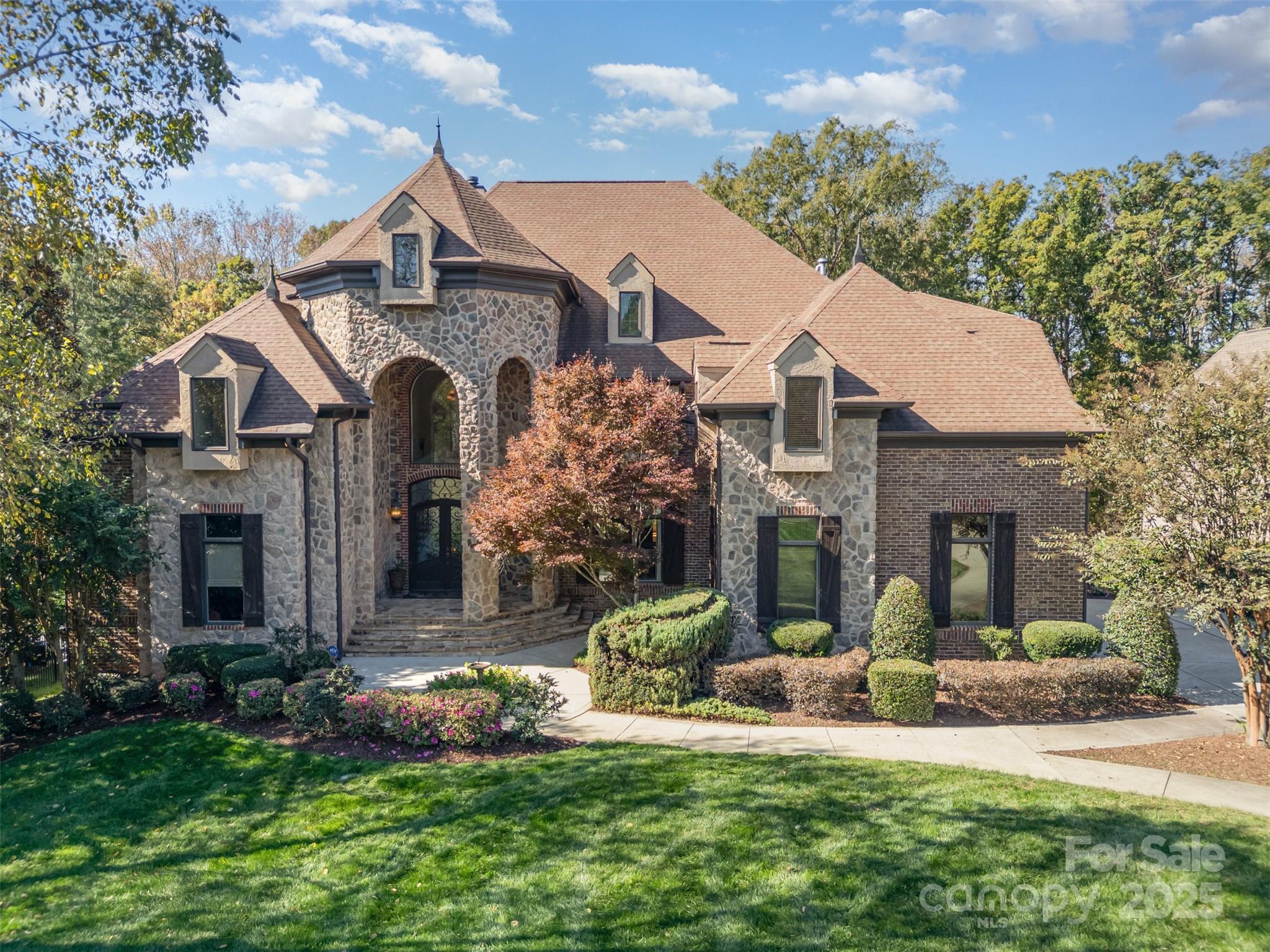 1610 Lookout Circle Waxhaw, NC 28173 - Photo 1 of 44 a front view of a house with a garden and plants