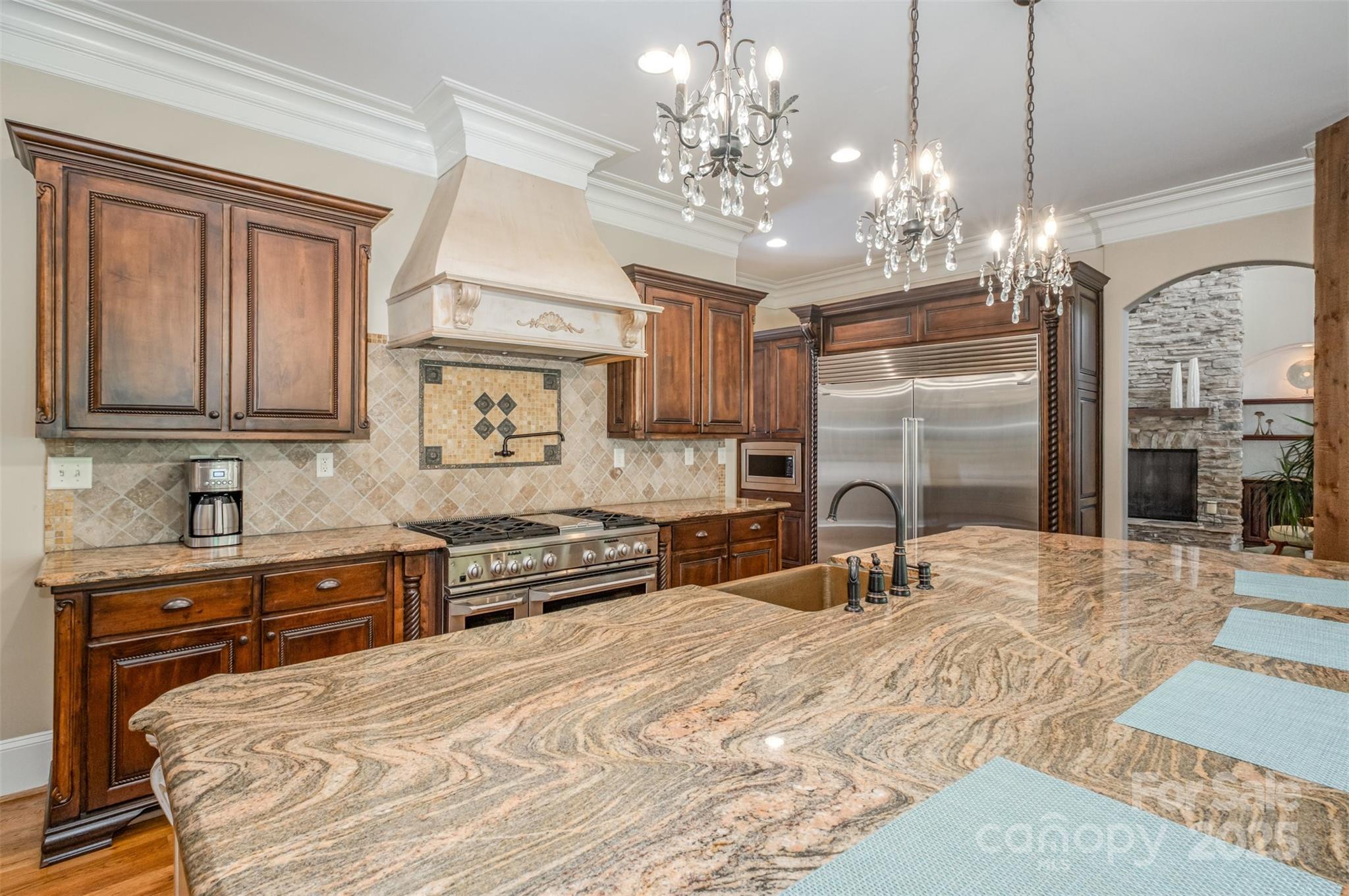 1610 Lookout Circle Waxhaw, NC 28173 - Photo 16 of 44 a large kitchen with kitchen island a sink stainless steel appliances and cabinets