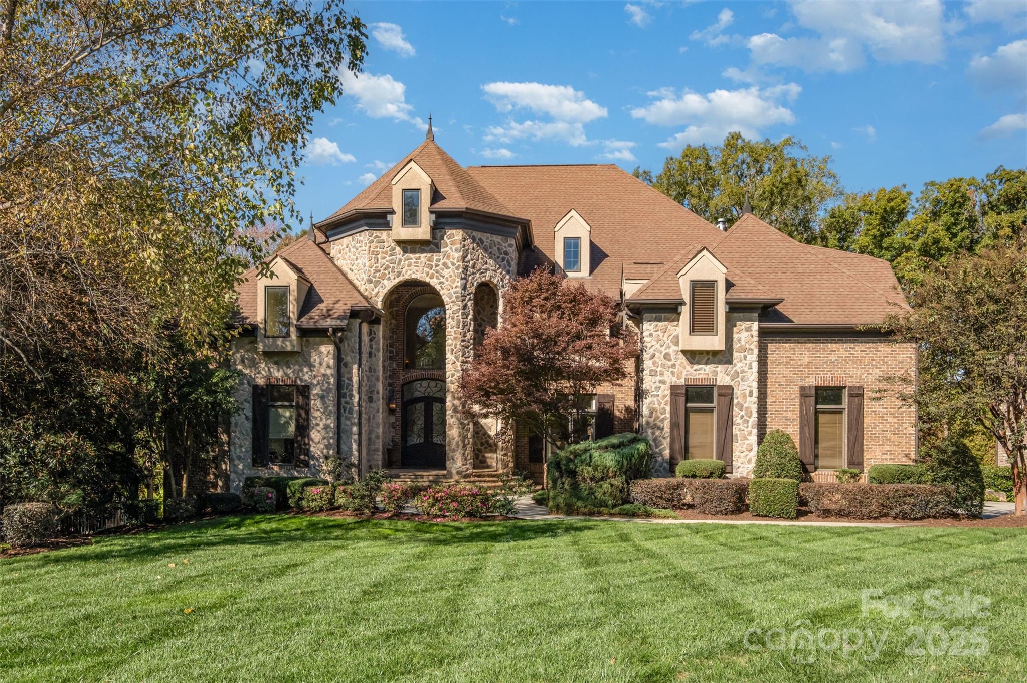 1610 Lookout Circle Waxhaw, NC 28173 - Photo 2 of 44 a front view of a house with a yard