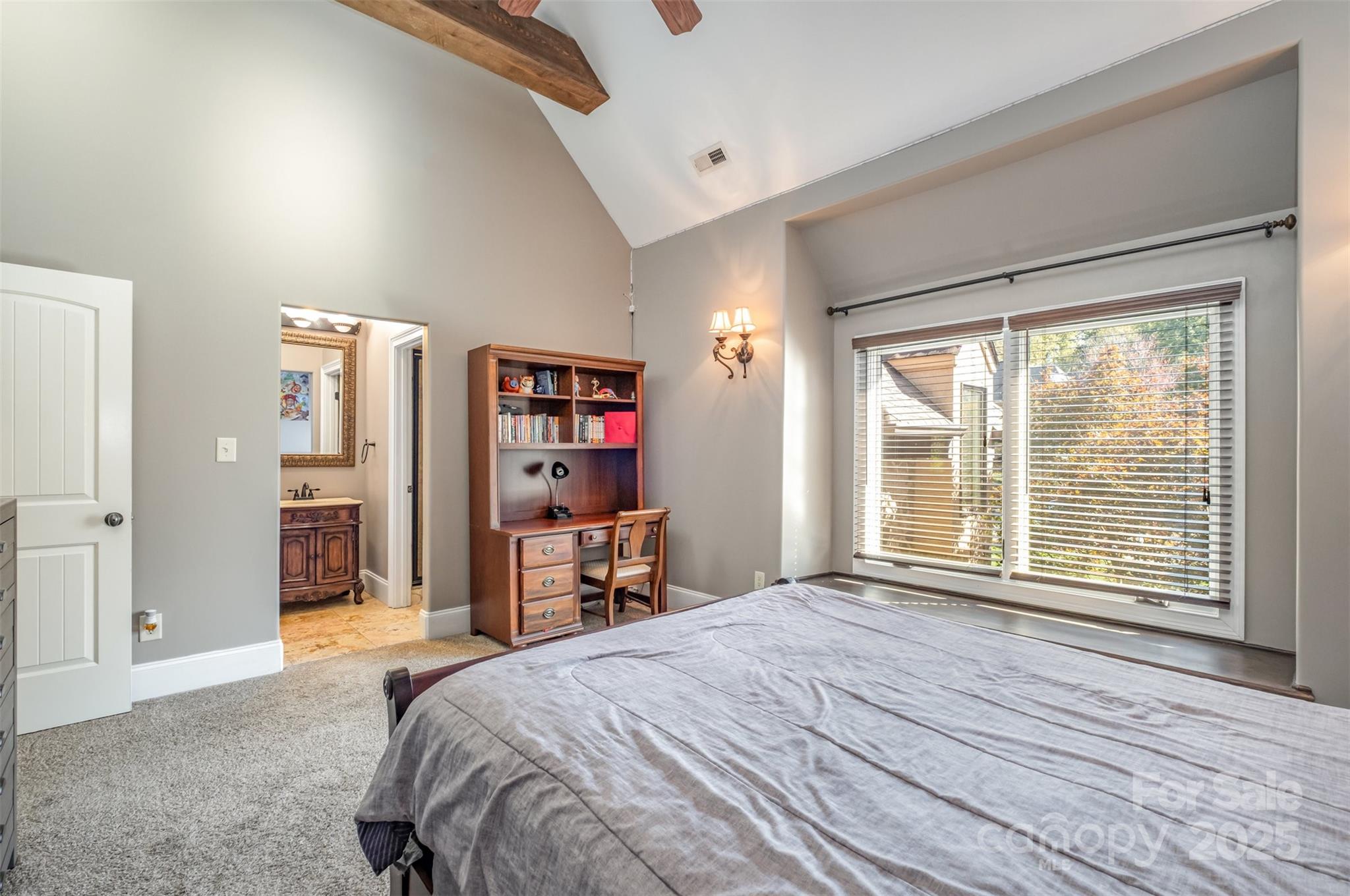 1610 Lookout Circle Waxhaw, NC 28173 - Photo 28 of 44 a bedroom with a bed and a large window