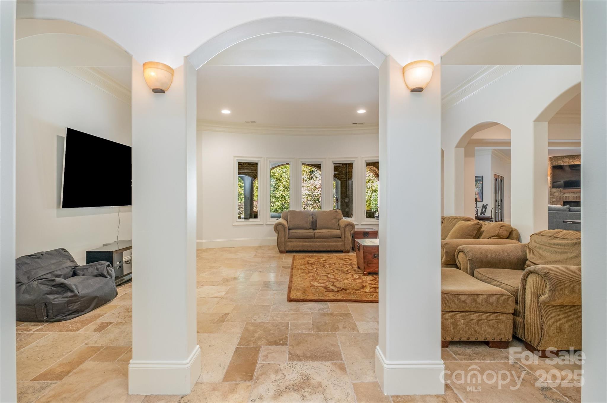 1610 Lookout Circle Waxhaw, NC 28173 - Photo 31 of 44 a living room with furniture and a flat screen tv