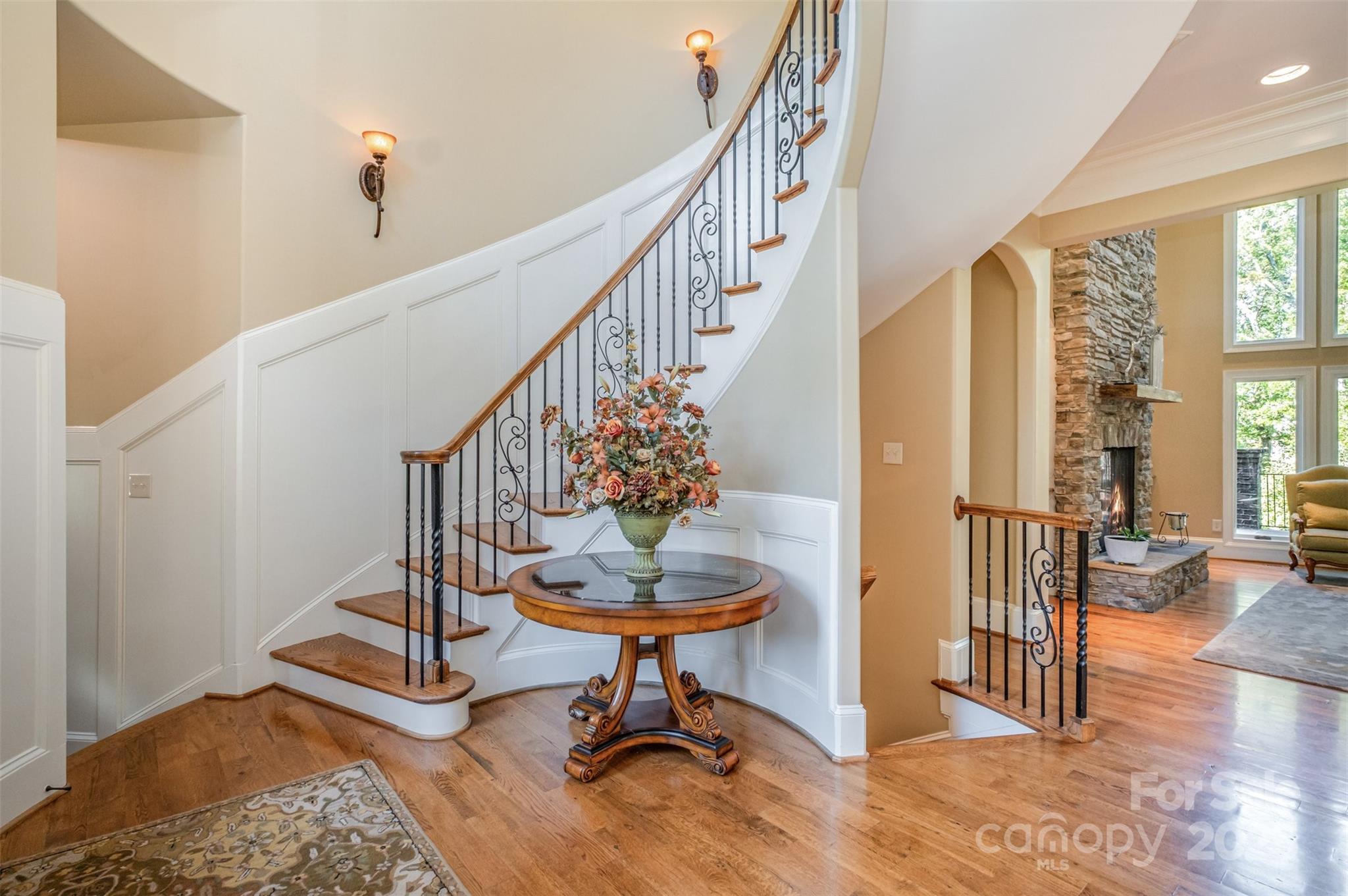 1610 Lookout Circle Waxhaw, NC 28173 - Photo 5 of 44 a view of a livingroom with furniture wooden floor and a rug