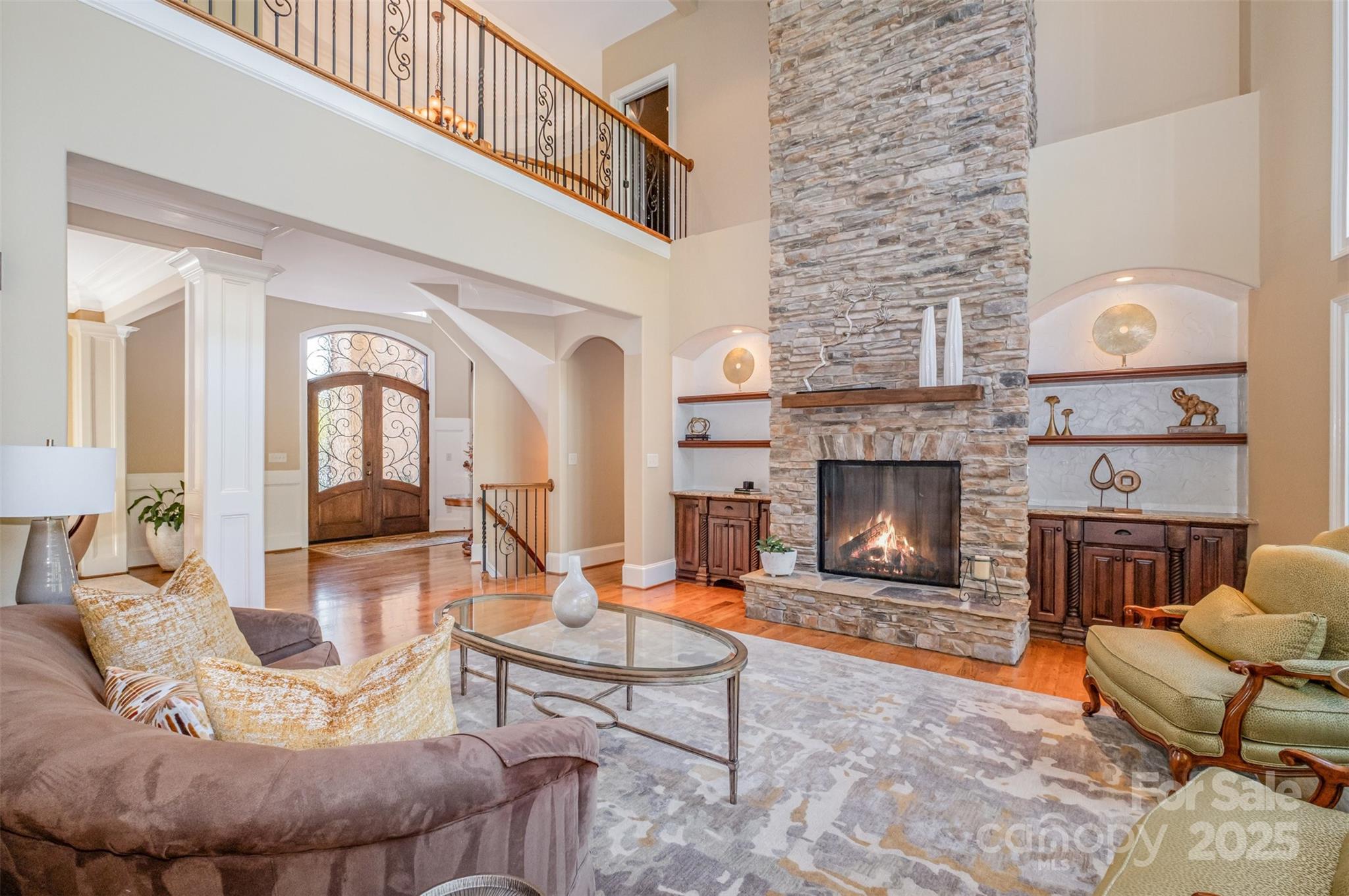 1610 Lookout Circle Waxhaw, NC 28173 - Photo 9 of 44 a living room with furniture a fireplace and a table