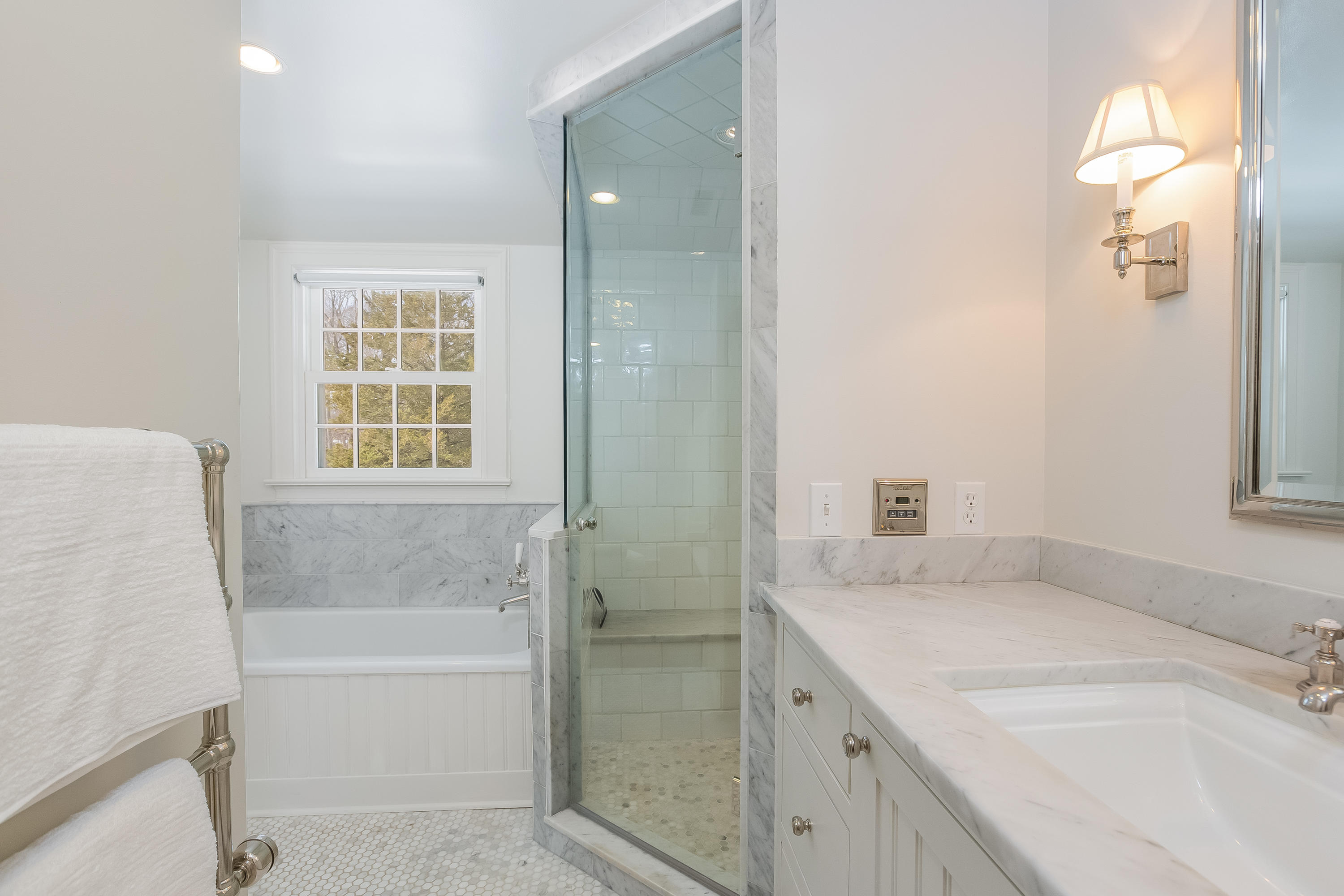 18 Wee Burn Lane Darien, CT 06820 - Photo 34 of 56 a bathroom with a tub sink and a mirror