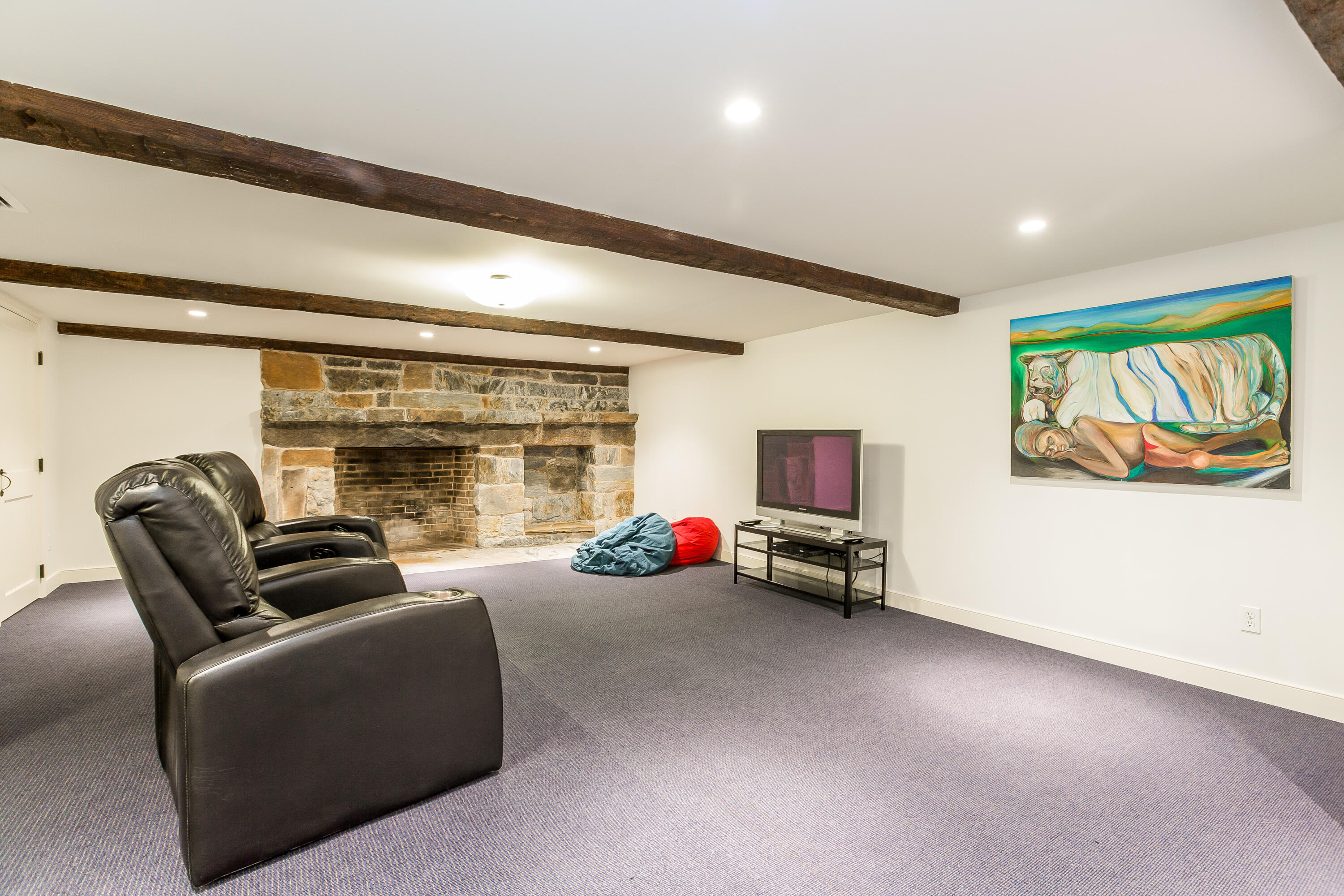 18 Wee Burn Lane Darien, CT 06820 - Photo 45 of 56 a living room with furniture and a flat screen tv