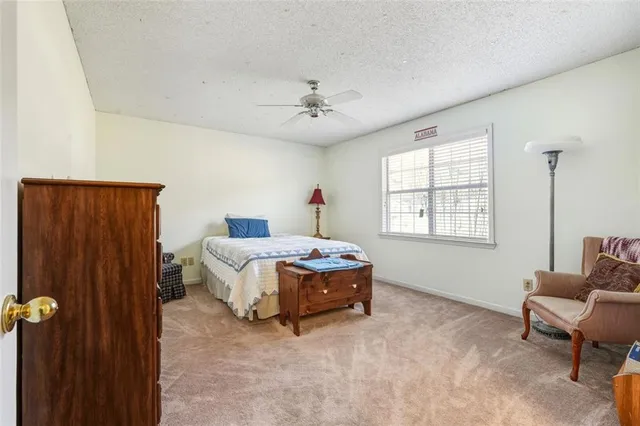 a view of swimming pool with a yard