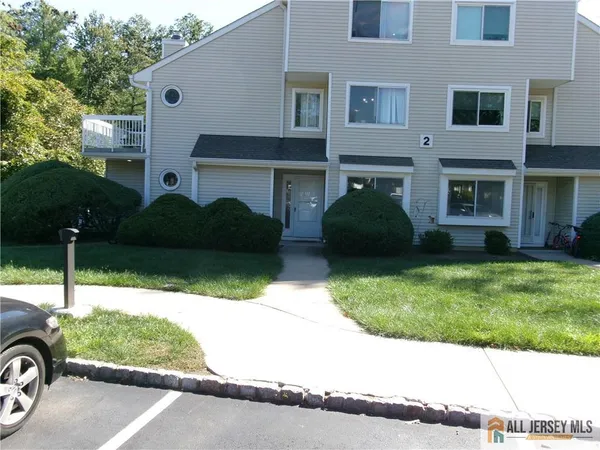 a house view with a garden space