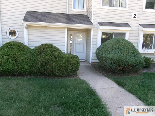 a view of backyard of a house