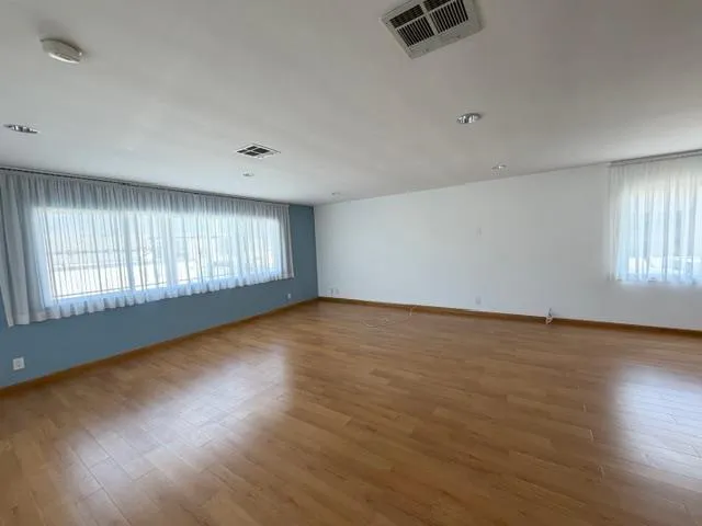 a kitchen with kitchen countertops and a stove