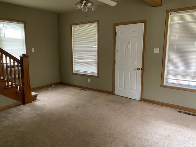 417 East Timber Street Pontiac, IL 61764 - Photo 8 of 10 an empty room with windows and closet