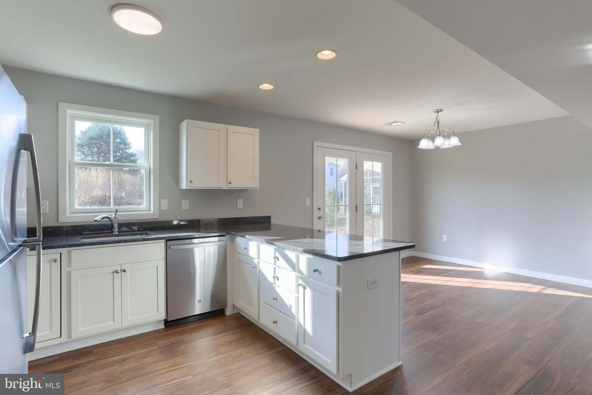 176 Lamp Post Lane Hershey, PA 17033 - Photo 16 of 33 a kitchen with granite countertop a sink and cabinets