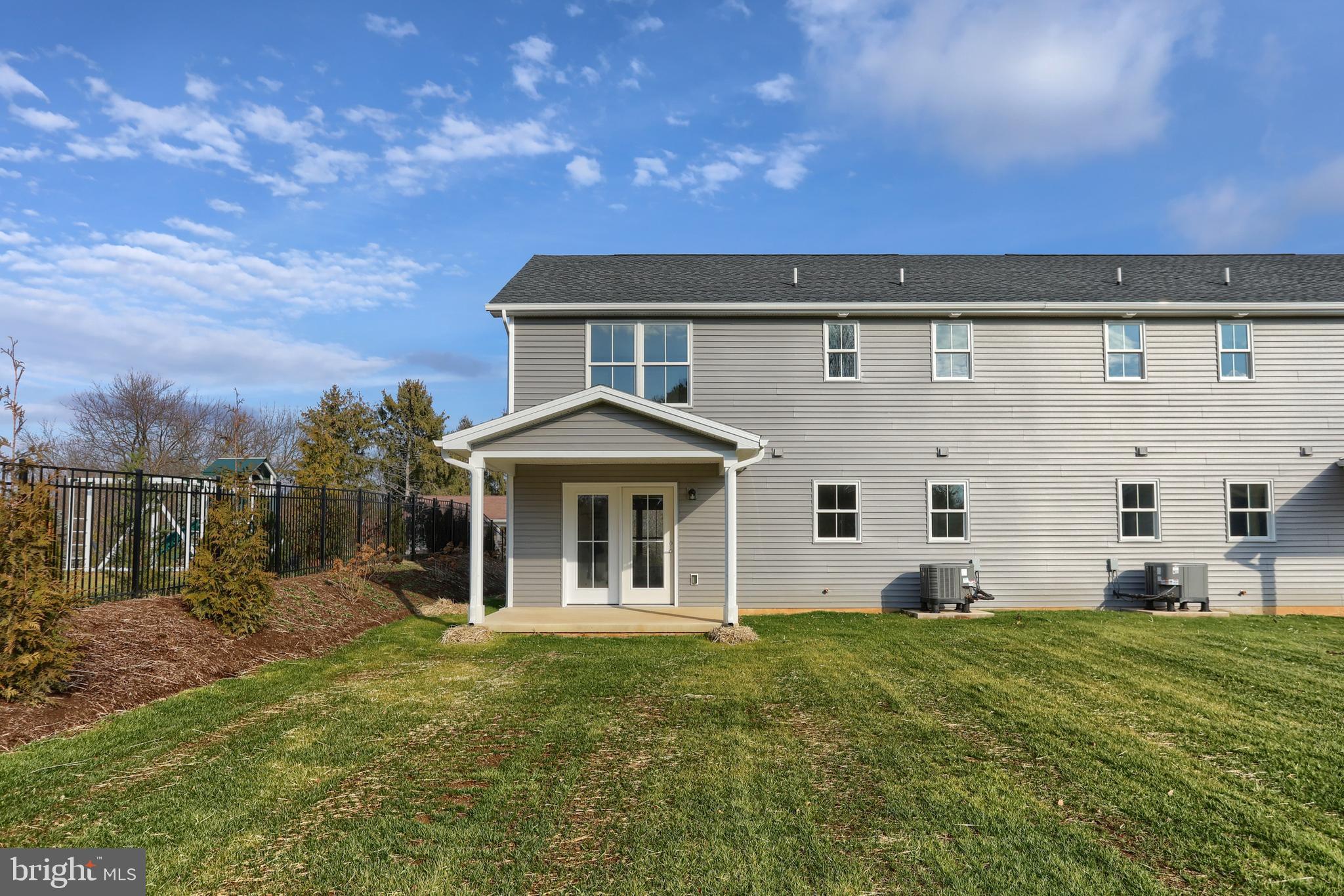 176 Lamp Post Lane Hershey, PA 17033 - Photo 32 of 33 a front view of a house with a garden
