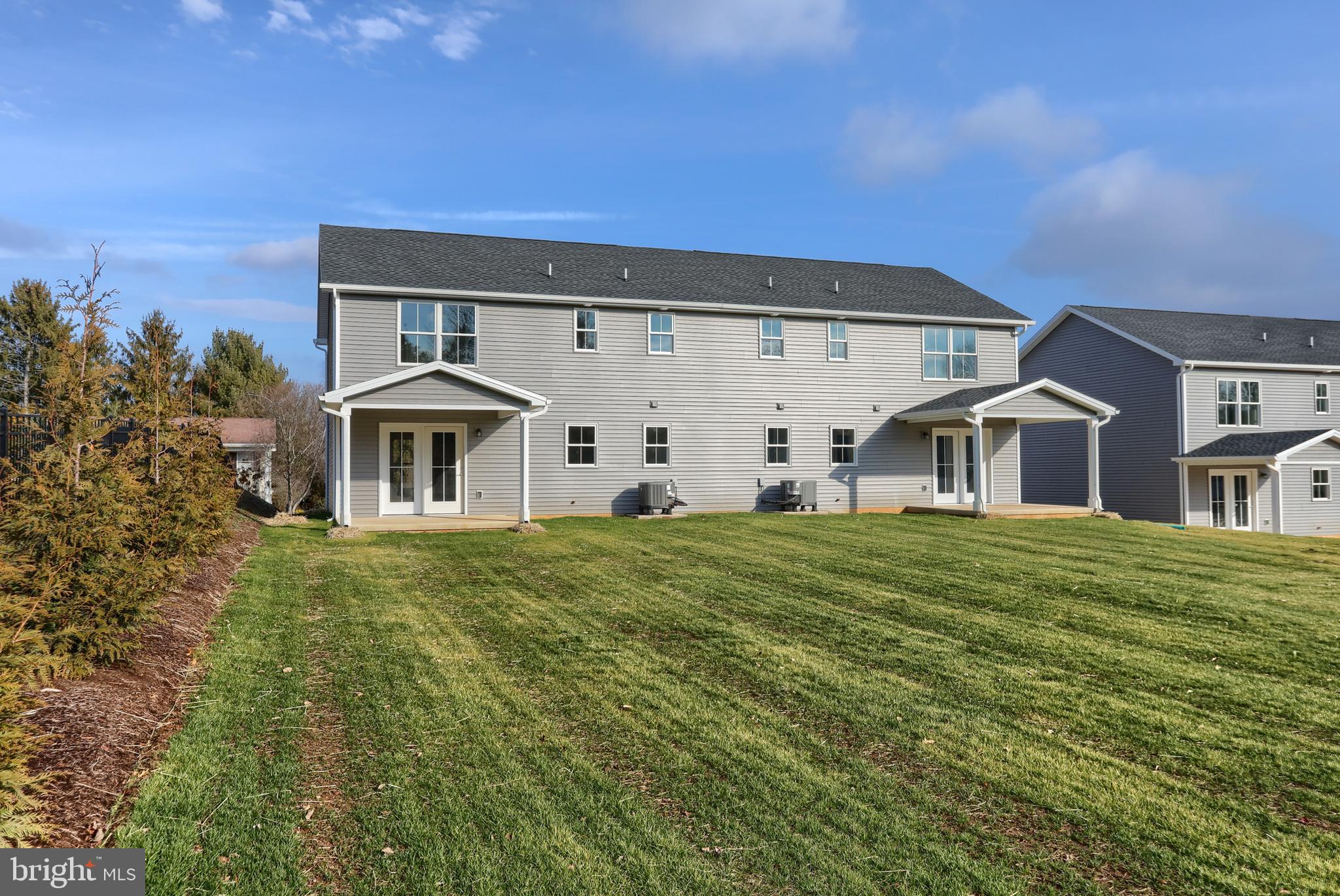 176 Lamp Post Lane Hershey, PA 17033 - Photo 33 of 33 a front view of a house with garden