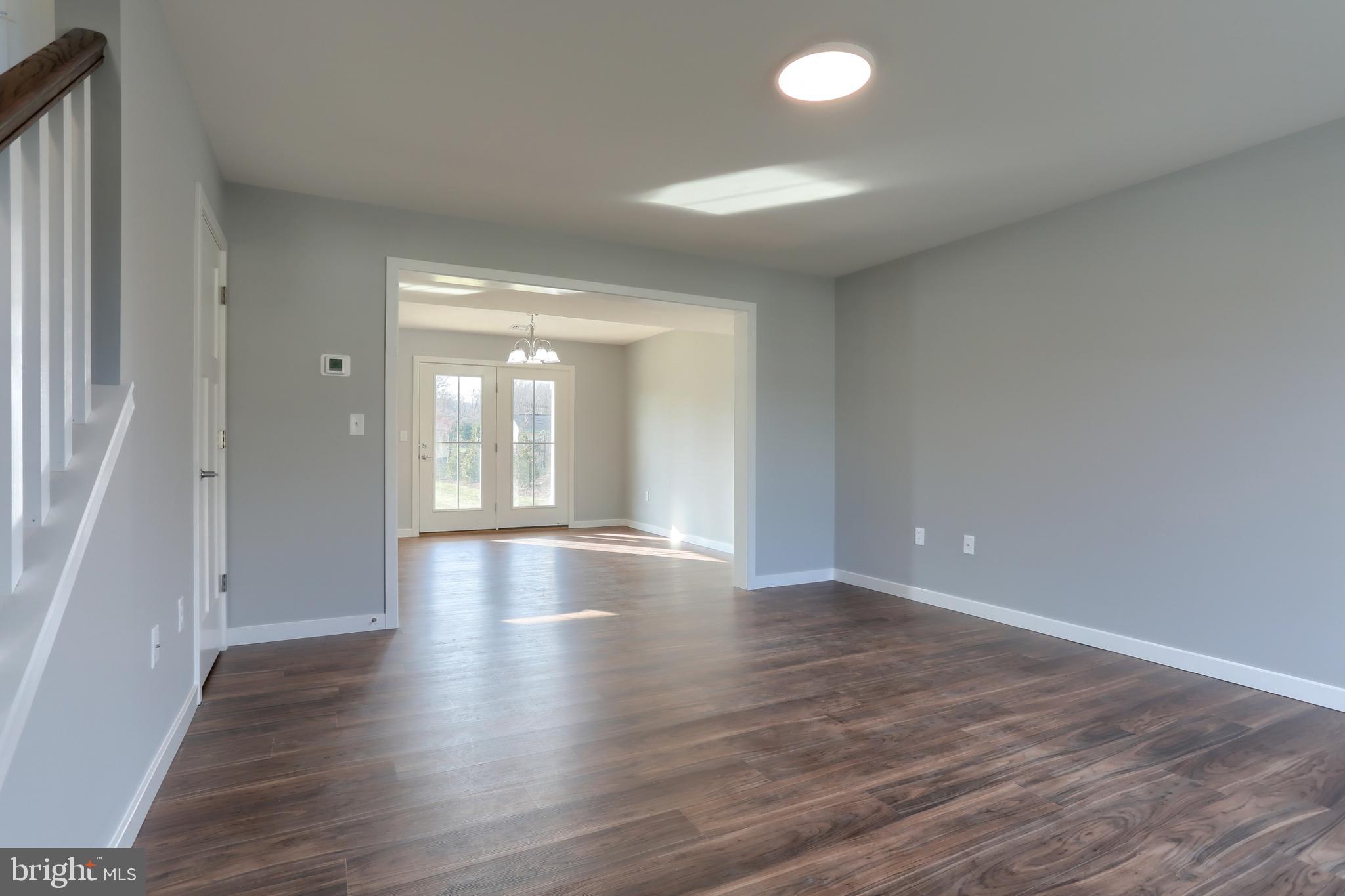 176 Lamp Post Lane Hershey, PA 17033 - Photo 7 of 33 wooden floor in an empty room with a window