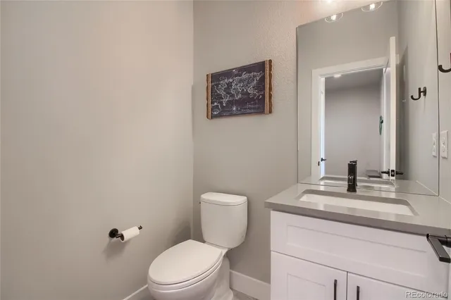 a bathroom with a shower and toilet